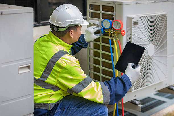Professional Air Conditioning Repair technician working in Lawrence, NY